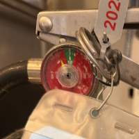 Example of a fire extinguisher that would fail inspection due to low pressure.