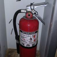 Example of a fire extinguisher with missing inspection tag